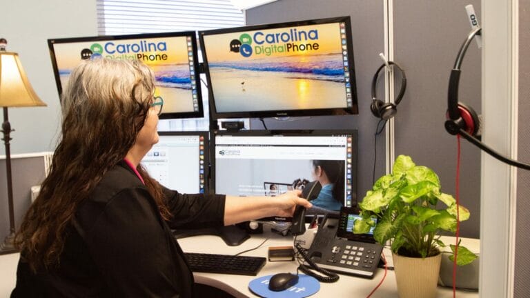 woman using a hosted phone system