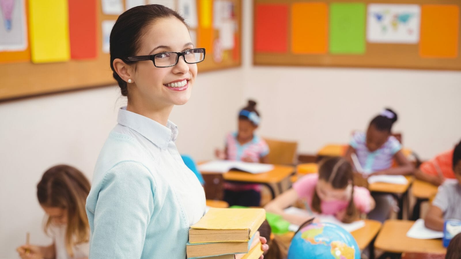 teacher thinking about VoIP solution for schools